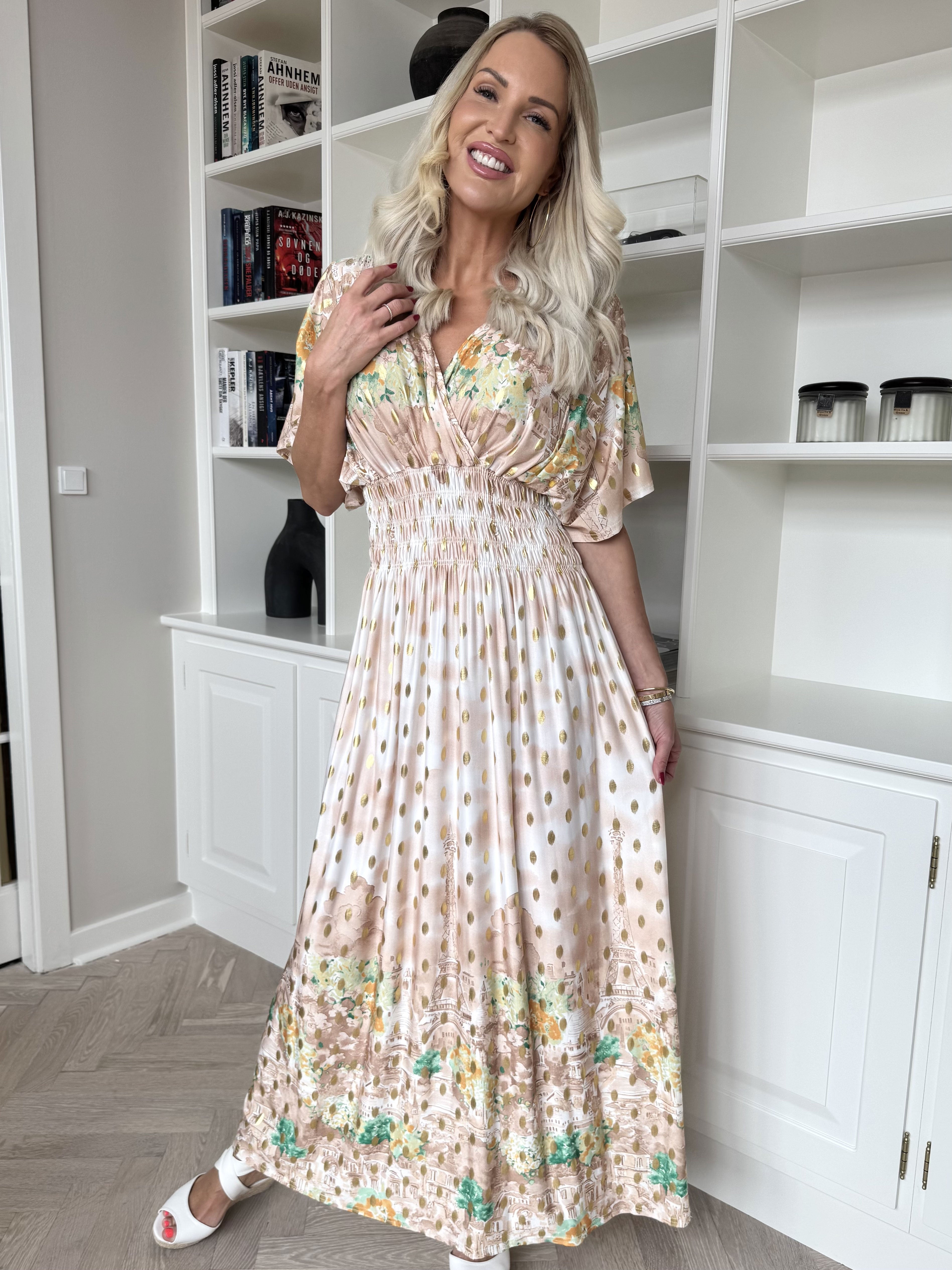 Pams Paris - Lång elastisk mönstrad klänning med guldnitar